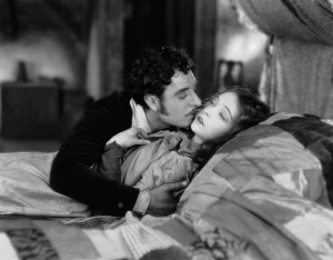 1926: John Gilbert (1899 - 1936) and Lillian Gish (1893 - 1993) in a scene from the film 'La Boheme' directed by King Vidor for MGM.